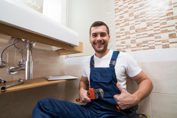 sanitary-technician-gesturing-thumb-up sanitary-technician-gesturing-thumb-up